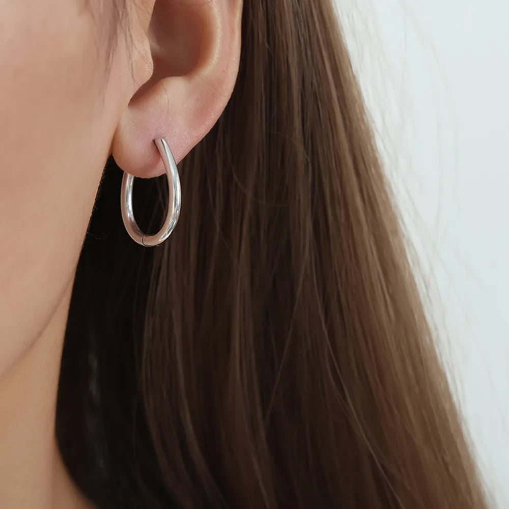 Titanium Steel Huggie Earrings - alternate earring view